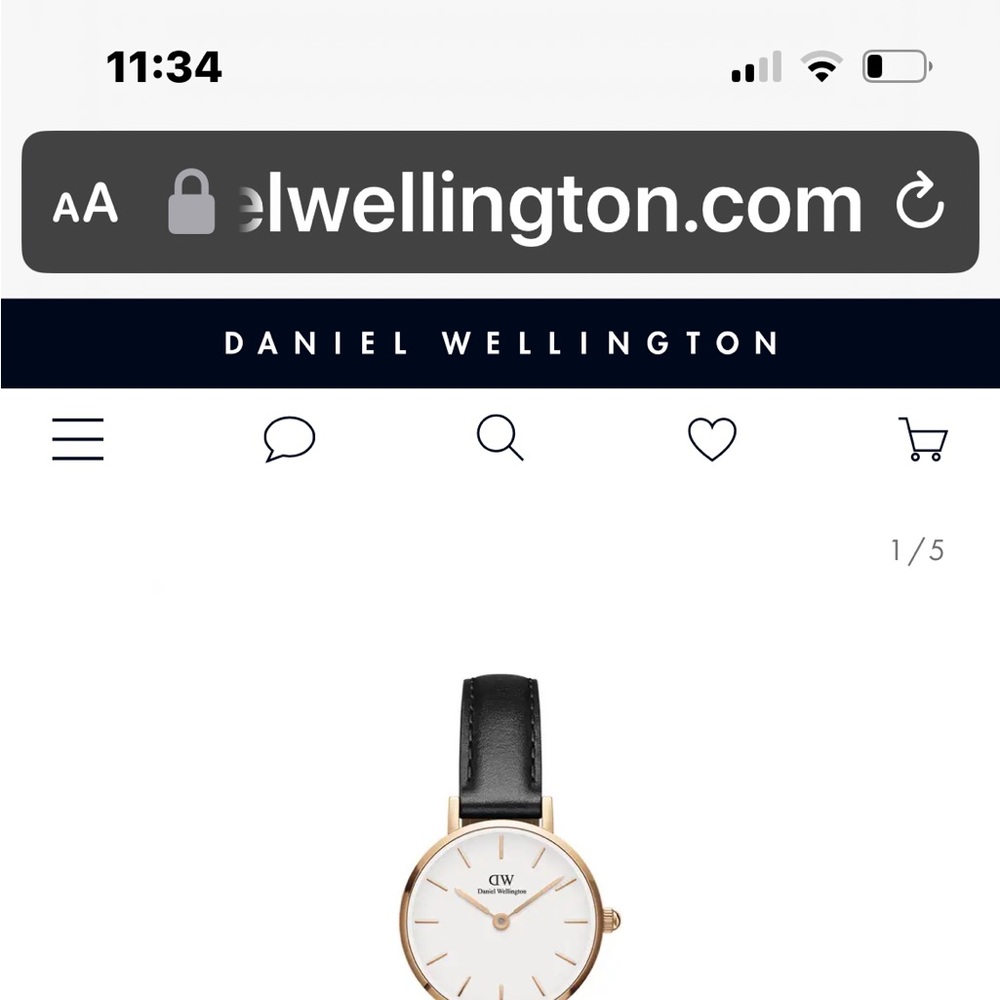 Daniel Wellington new watch with brown leather strap and black fabric strap